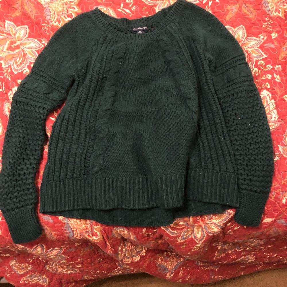 Women’s dark green sweater